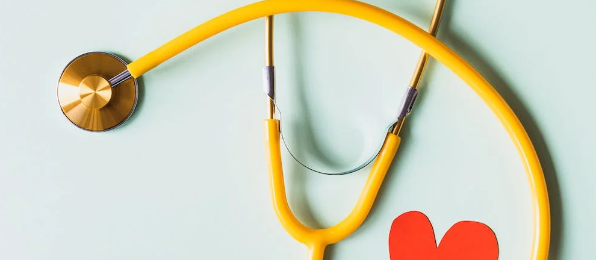 Yellow Stethoscope and a red heart